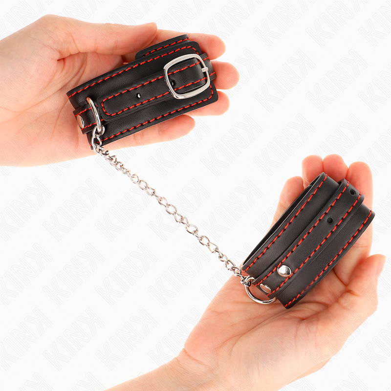 KINK - PEQUENAS RESTRIÇÕES DE PULSO PRETAS COM FORRO VERMELHO AJUSTÁVEIS 14-24 CM X 3,5 CM